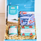 Beach Lovers Gift Set with Cornish illustrated coaster, aromatherapy ocean breeze candle, hand crafted coastal soap, sea salt chocolate.