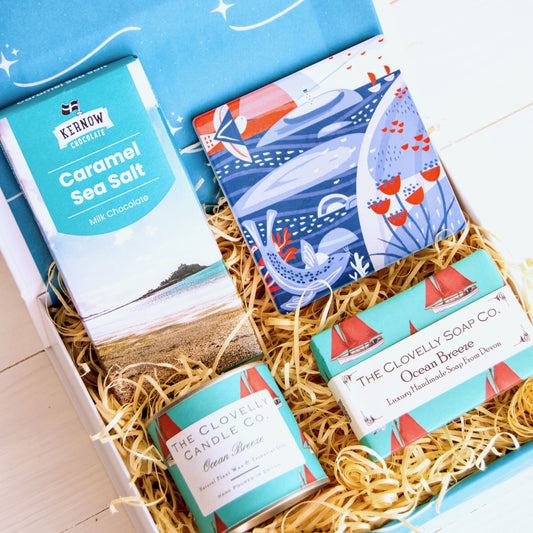 Beach Lovers Gift Set with Cornish illustrated coaster, aromatherapy ocean breeze candle, hand crafted coastal soap, sea salt chocolate.