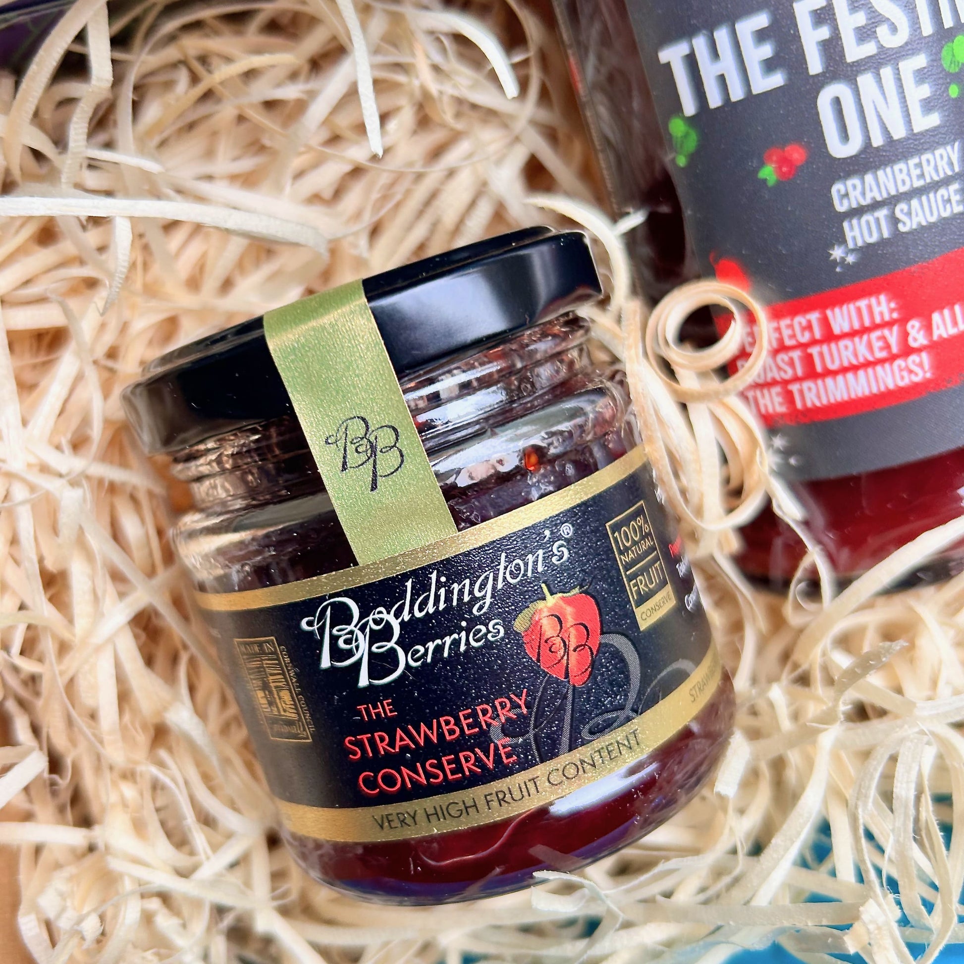Christmas Gift Hamper packed with Devon and Cornish products including hot cranberry sauce, elderflower bubbly, kernow chocolate, Cornish jam, Exmoor tea - sustainable christmas hamper
