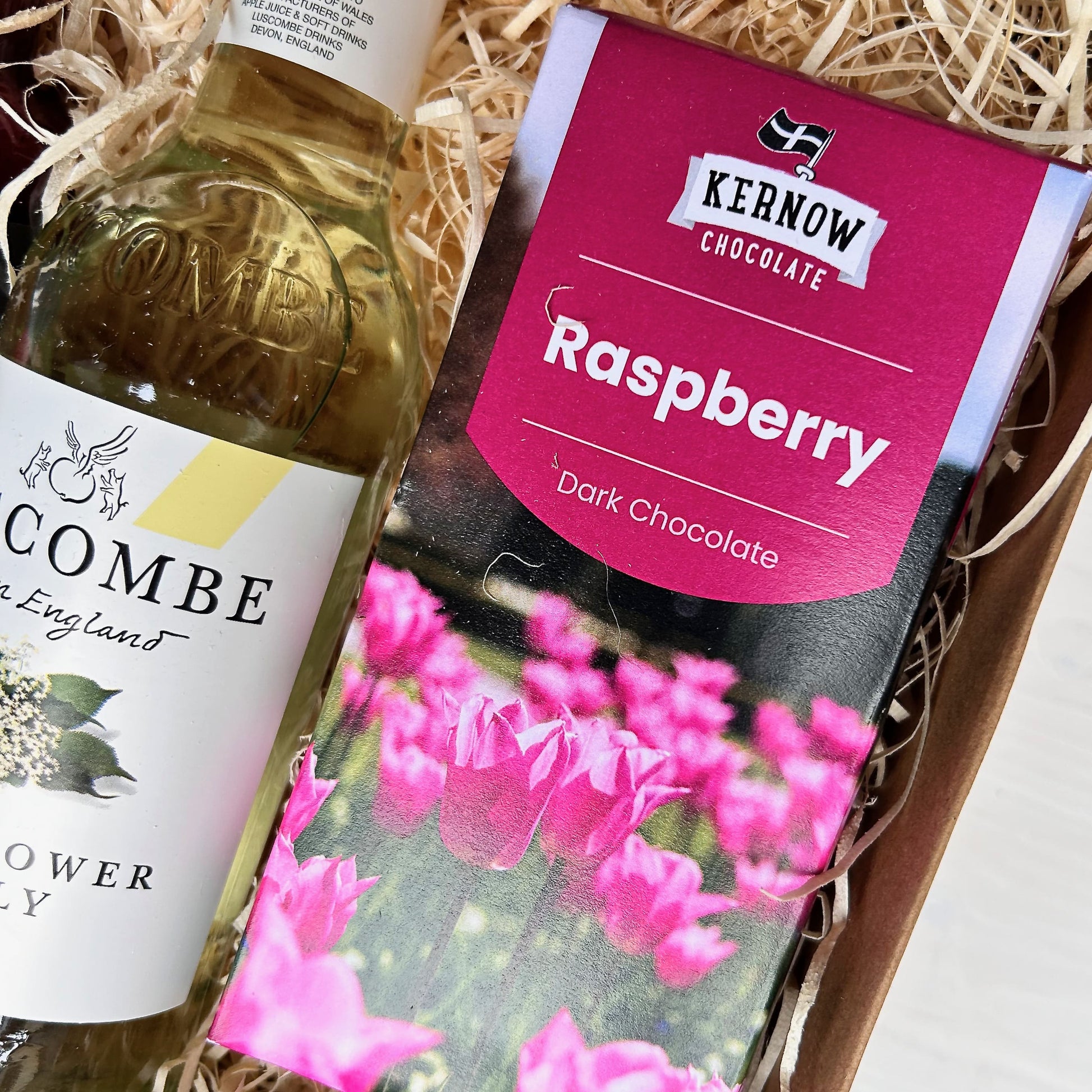 Christmas Gift Hamper packed with Devon and Cornish products including hot cranberry sauce, elderflower bubbly, kernow chocolate, Cornish jam, Exmoor tea - sustainable christmas hamper