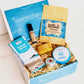 New Mum Gift Hamper perfect for new mother or mum-to - be with bump balm, aromatherapy oil, natural bath bomb, luxury lip balm, Cornish chocolate and herbal tea.