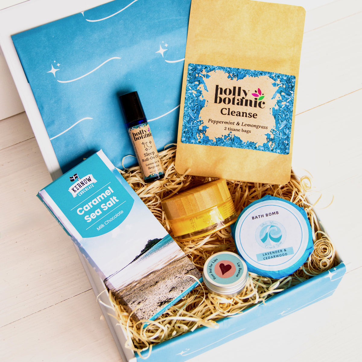 New Mum Gift Hamper perfect for new mother or mum-to - be with bump balm, aromatherapy oil, natural bath bomb, luxury lip balm, Cornish chocolate and herbal tea.