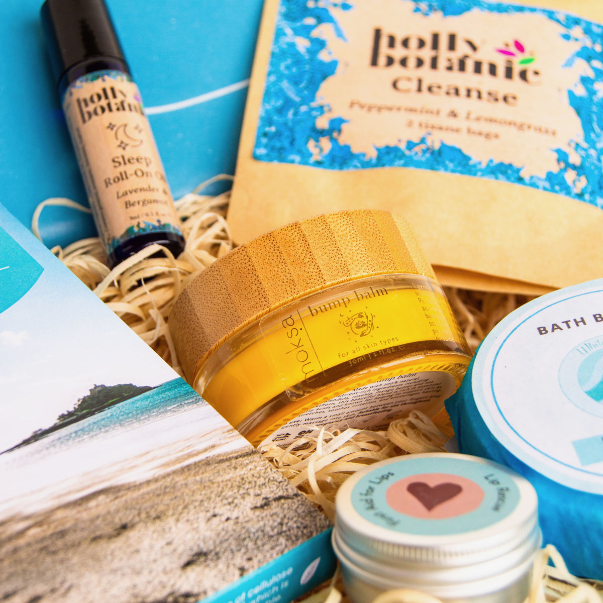 New Mum Gift Hamper perfect for new mother or mum-to - be with bump balm, aromatherapy oil, natural bath bomb, luxury lip balm, Cornish chocolate and herbal tea.