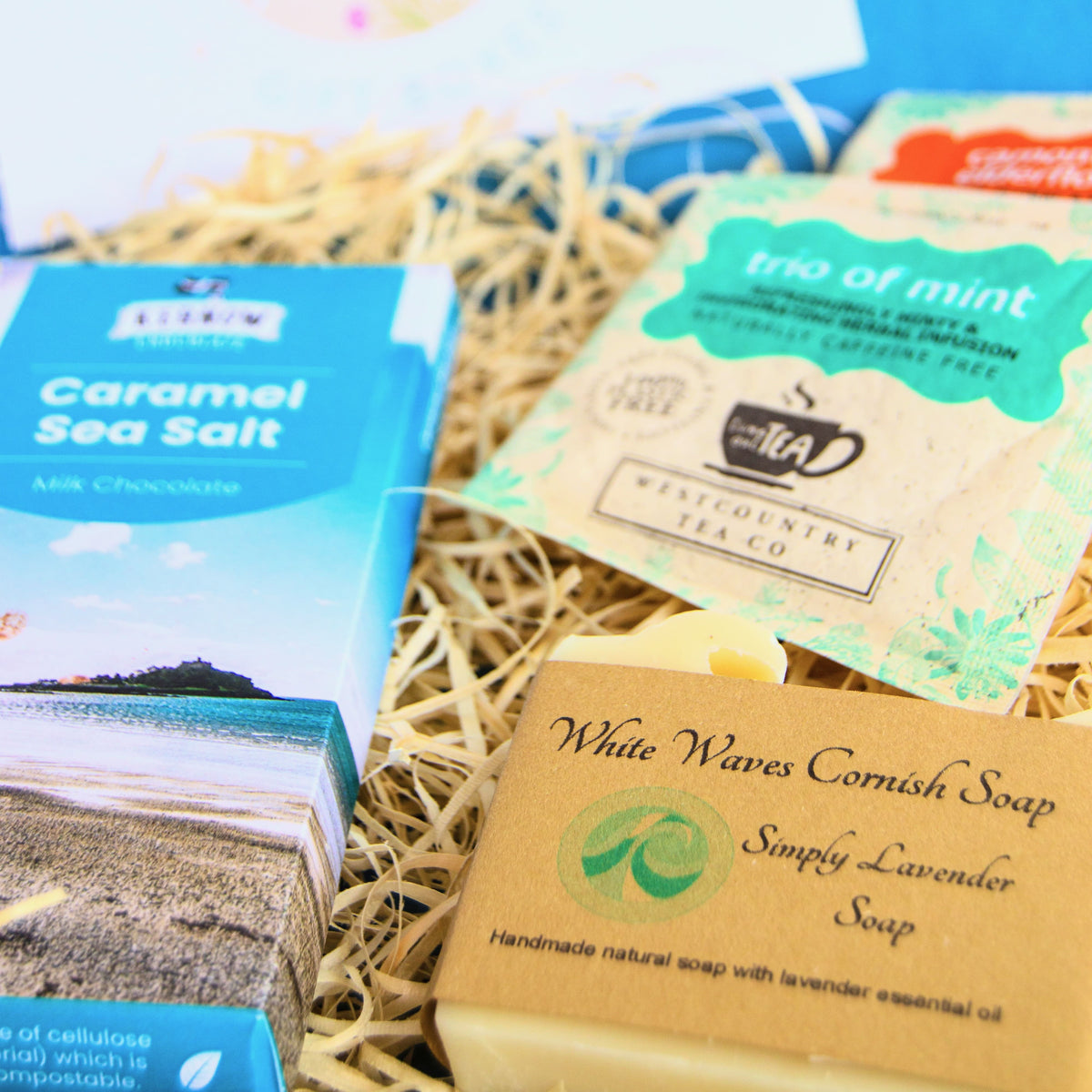 Cornish letterbox gift set with White Waves Cornish Soap, artisan caramel sea salt chocolate from Kernow chocolaate and herbal tea.