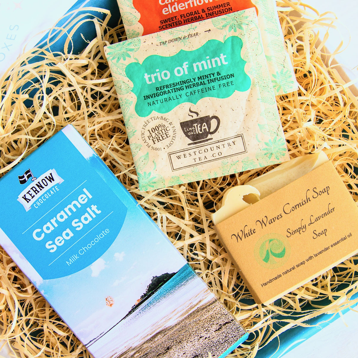 Cornish letterbox gift set with White Waves Cornish Soap, artisan caramel sea salt chocolate from Kernow chocolaate and herbal tea.