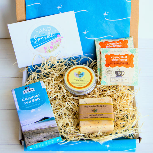 Letterbox pamper gift set with natural soap, natural spa cosmetics body scrub, cornish artisan sea salt soap and herbal tea - Devon and Cornish products.