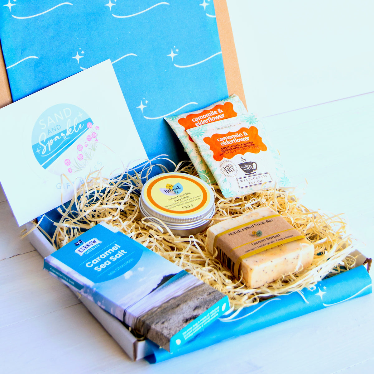 Letterbox pamper gift set with natural soap, natural spa cosmetics body scrub, cornish artisan sea salt soap and herbal tea - Devon and Cornish products.