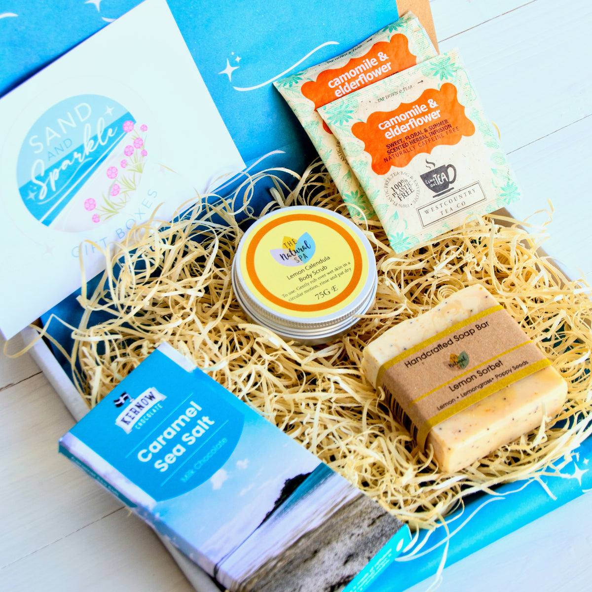 Letterbox pamper gift set with natural soap, natural spa cosmetics body scrub, cornish artisan sea salt soap and herbal tea - Devon and Cornish products.
