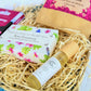 Natural Perfume Pamper Gift Set with Clovelly Soap Natural perfume, rose geranium soap, artisan raspberry dark chocolate soap and herbal tea - unwind with lemon balm and hibiscus. Made in Devon and Cornwall.