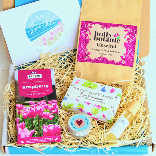Natural Perfume Pamper Gift Set with Clovelly Soap Natural perfume, rose geranium soap, luxury lip balm and artisan raspberry dark chocolate soap and herbal tea - unwind with lemon balm and hibiscus. Made in Devon and Cornwall.