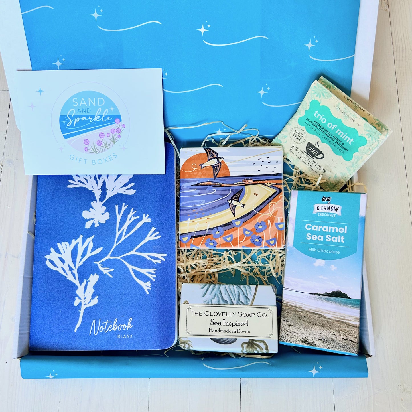 Ocean Letterbox Gift with notebook, Cornish coaster, sea inspired natural soap made in Devon, artisan Cornish chocolate and tea