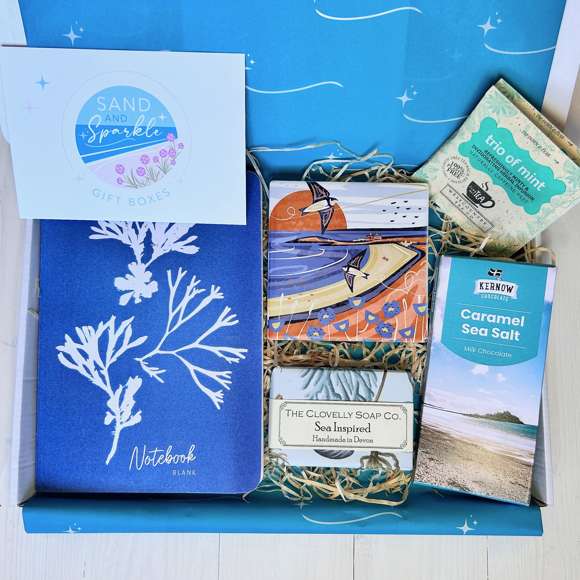 Ocean Letterbox Gift with notebook, Cornish coaster, sea inspired natural soap made in Devon, artisan Cornish chocolate and tea