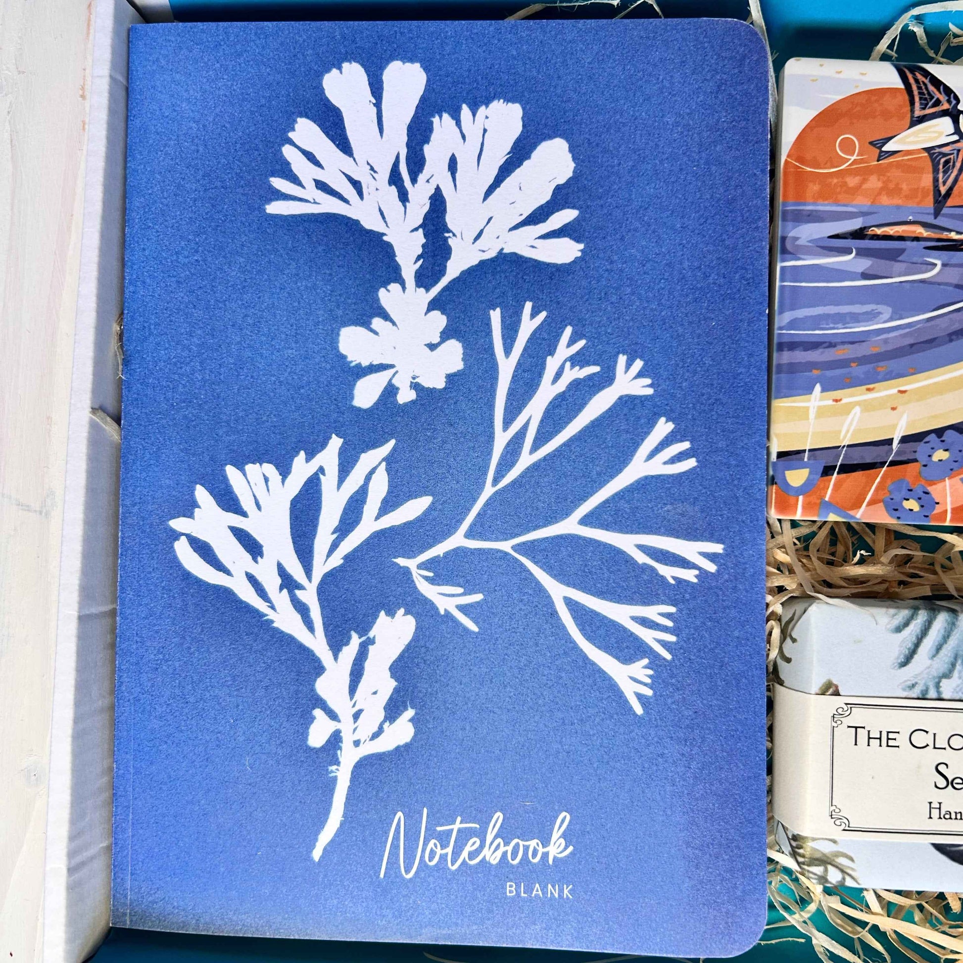Ocean Letterbox Gift with notebook, Cornish coaster, sea inspired natural soap made in Devon, artisan Cornish chocolate and tea