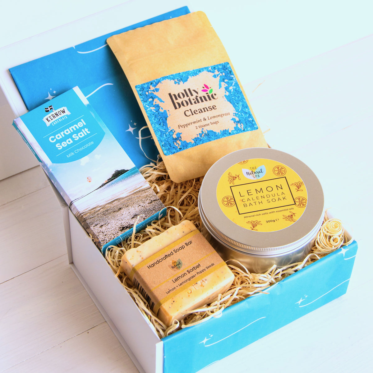 Pamper Hamper with lemon calendula bath soak, hand crafted soap, herbal peppermint and lemongrass tea and artisan Cornish chocolate.