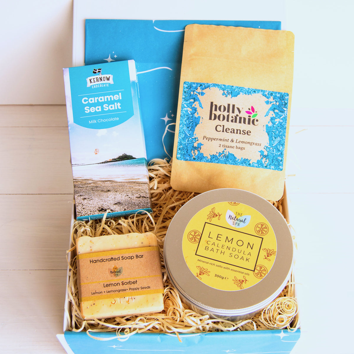 Pamper Hamper with lemon calendula bath soak, hand crafted soap, herbal peppermint and lemongrass tea and artisan Cornish chocolate.