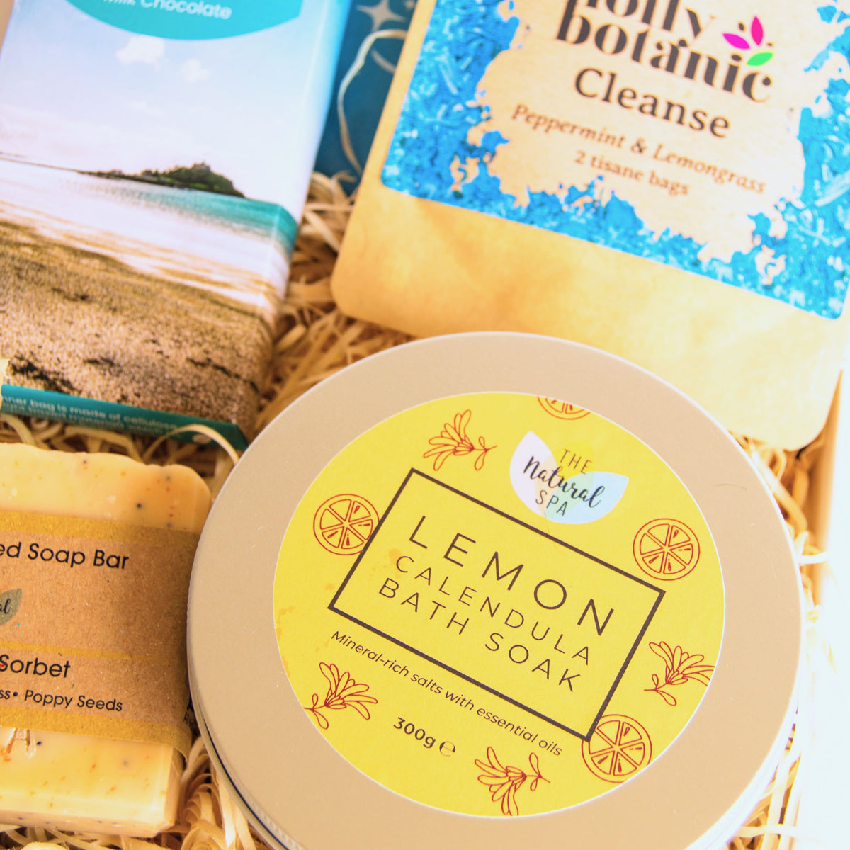 Pamper Hamper with lemon calendula bath soak, hand crafted soap, herbal peppermint and lemongrass tea and artisan Cornish chocolate.